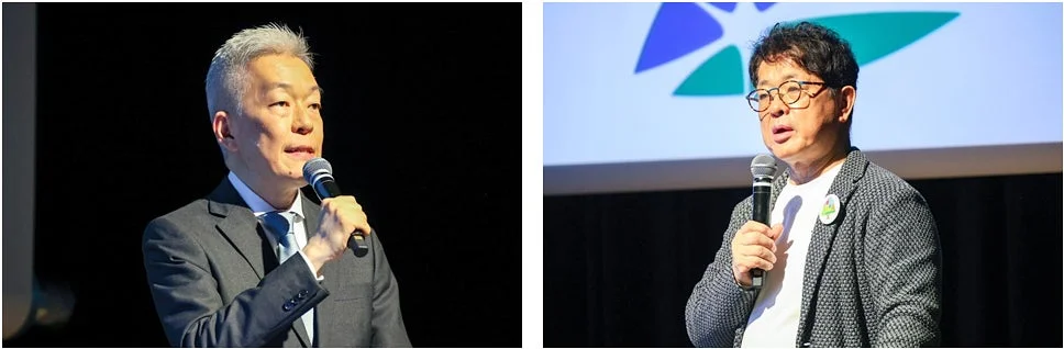 講演する男性たち